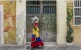 Imagen de mujer Palenquera en Cartagena y el turismo potencial y riesgos